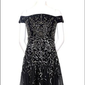 Black and sliver sequined Adrianna Pappell gown.